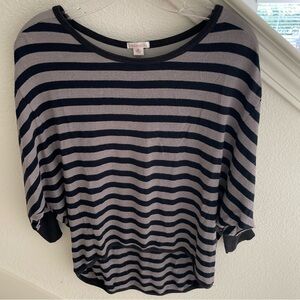 Xhilaration High Low top. Size M